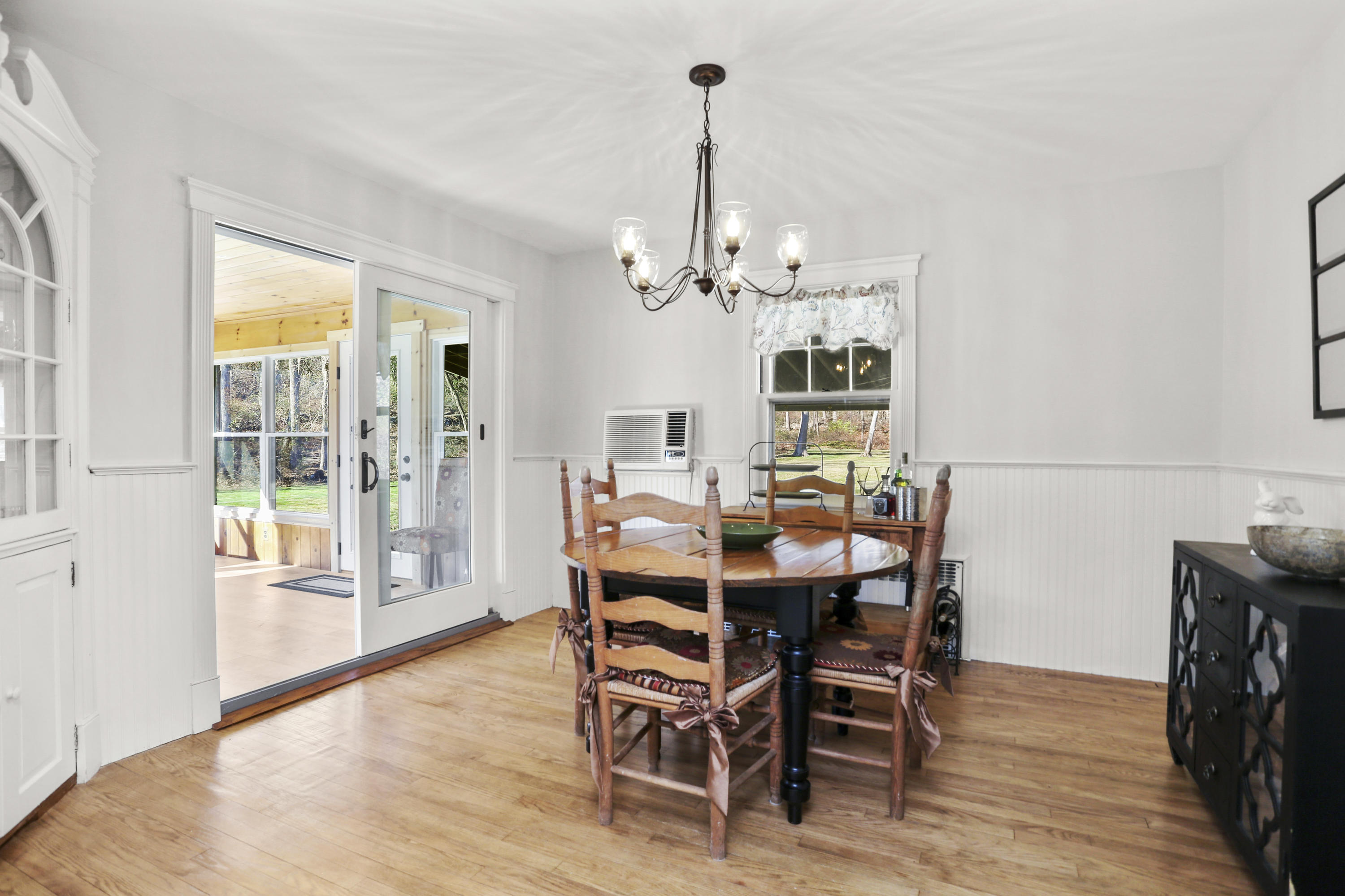 10 Stephen Mather Road Norwalk, CT 06850 - Photo 10 of 29 a view of a dining room with furniture wooden floor and chandelier