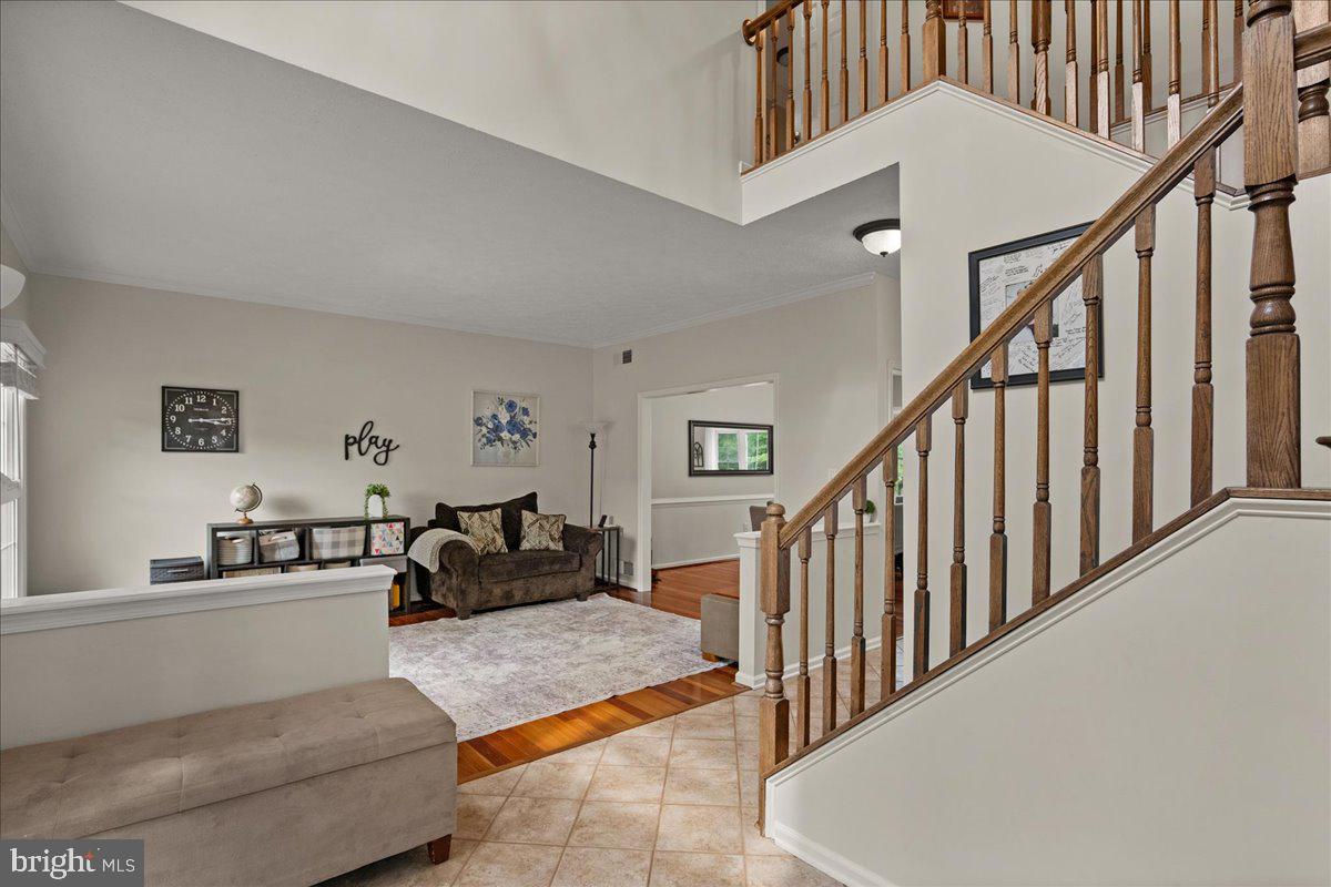 308 Huntersridge Road Winchester, VA 22602 - Photo 5 of 65 Inviting entryway with elegant staircase.