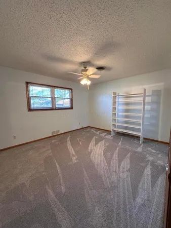 a view of a livingroom with a staircase