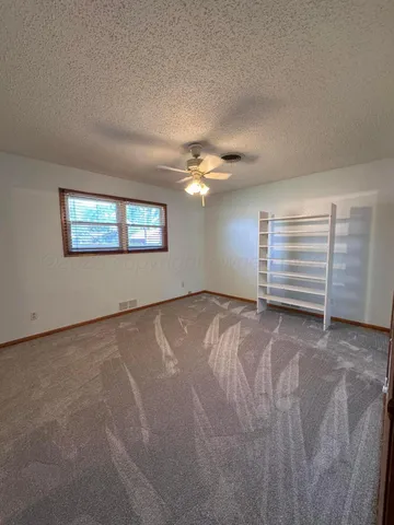 a view of a livingroom with a staircase