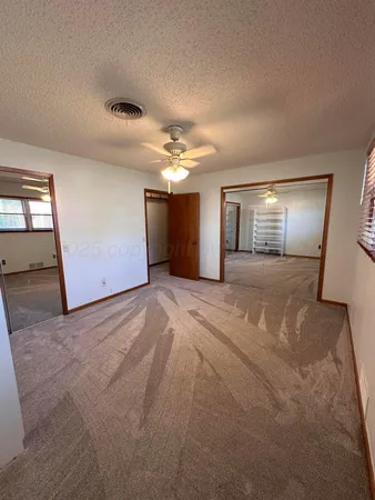 a bathroom with a sink a vanity and a shower