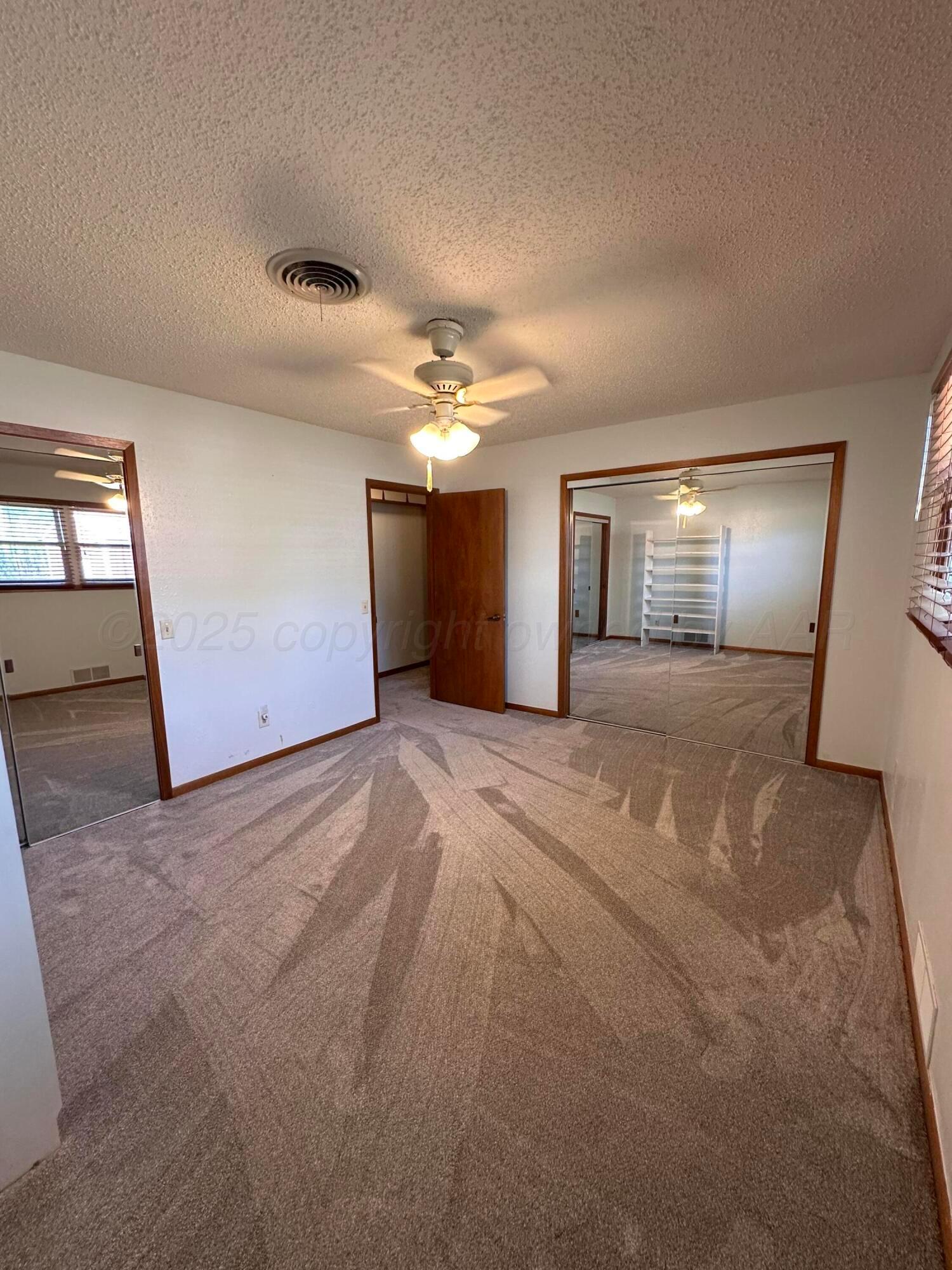 1007 Archer Street Spearman, TX 79081 - Photo 9 of 20 a view of a livingroom with a staircase