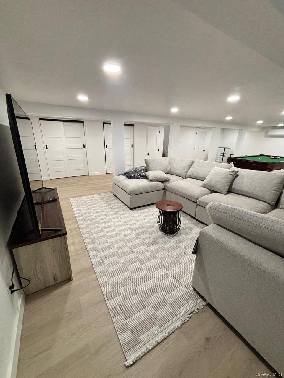 791 Longview Avenue Valley Stream, NY 11581 - Photo 15 of 33 Living area featuring light wood finished floors, billiards, and recessed lighting