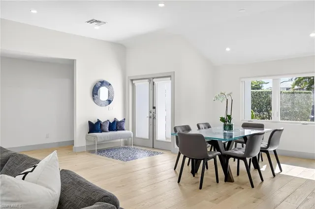 a large kitchen with stainless steel appliances lots of counter top space