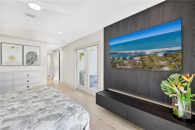 a kitchen with sink stove and refrigerator