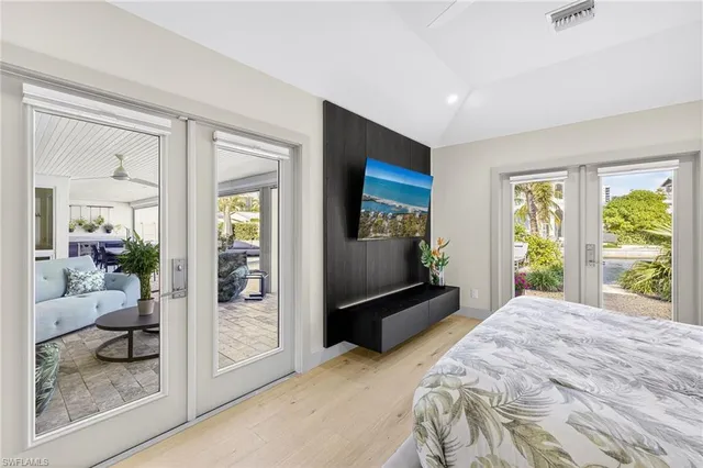 a bathroom with 2 sink and a mirror