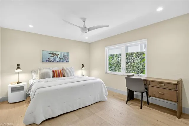 a utility room with sink dryer and washer