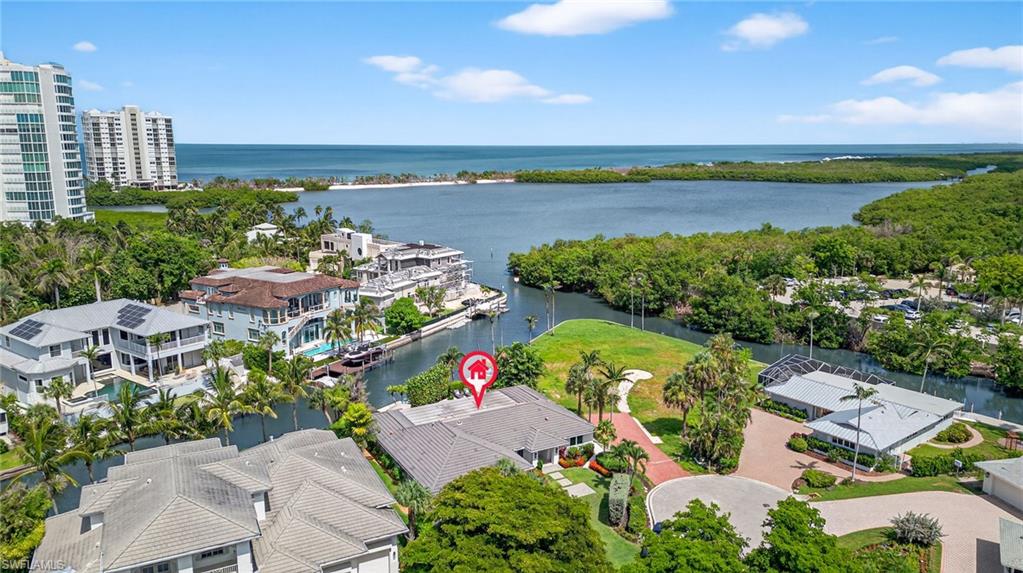5215 Seashell Avenue Naples, FL 34103 - Photo 9 of 47 an aerial view of a city