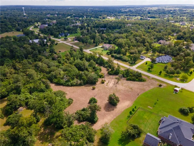 an aerial view of a city with lots of residential buildings