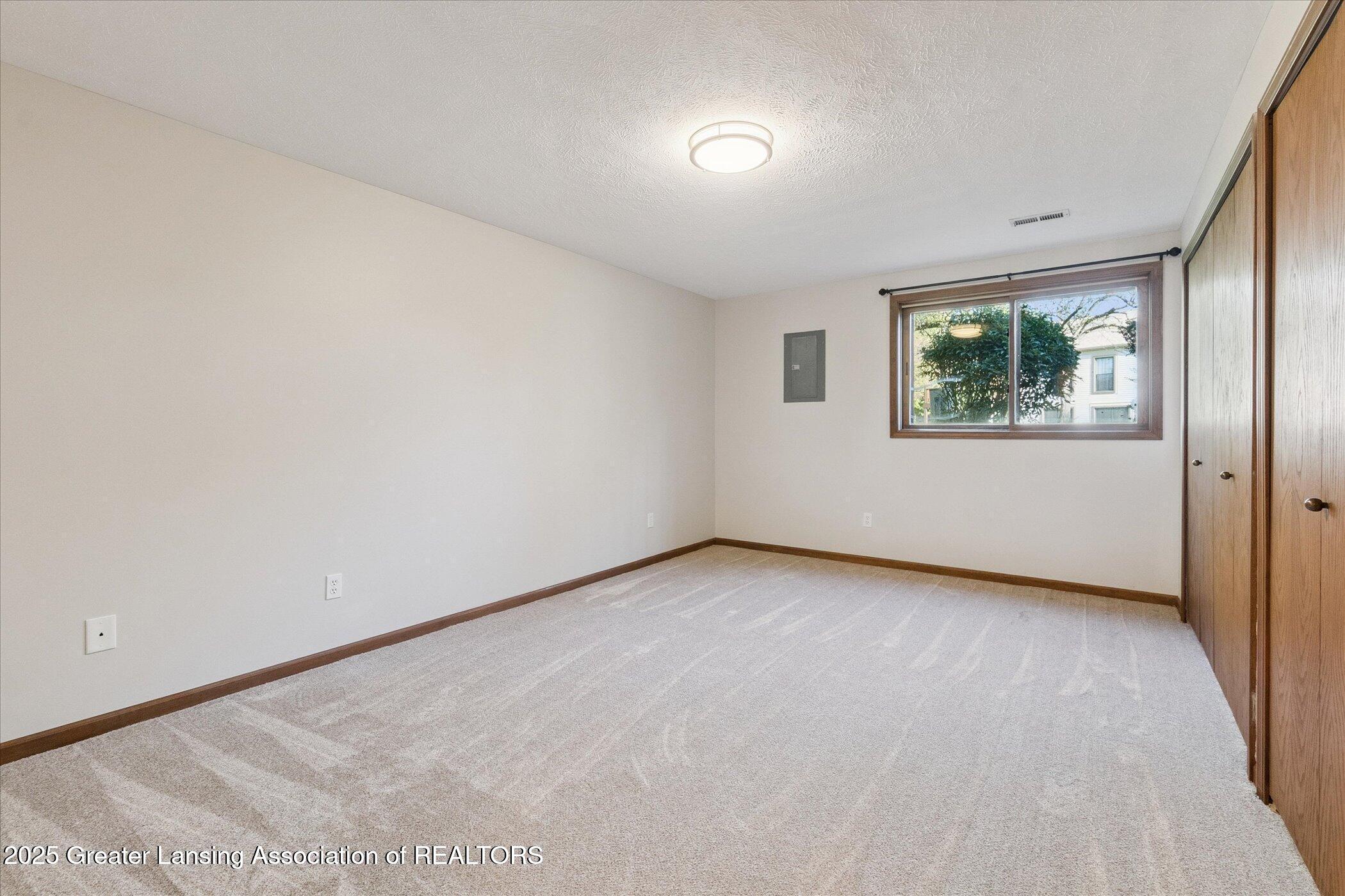 6512 Spring Tree Lane, Unit 14 Lansing, MI 48917 - Photo 23 of 38 20250927114521618921000000-o