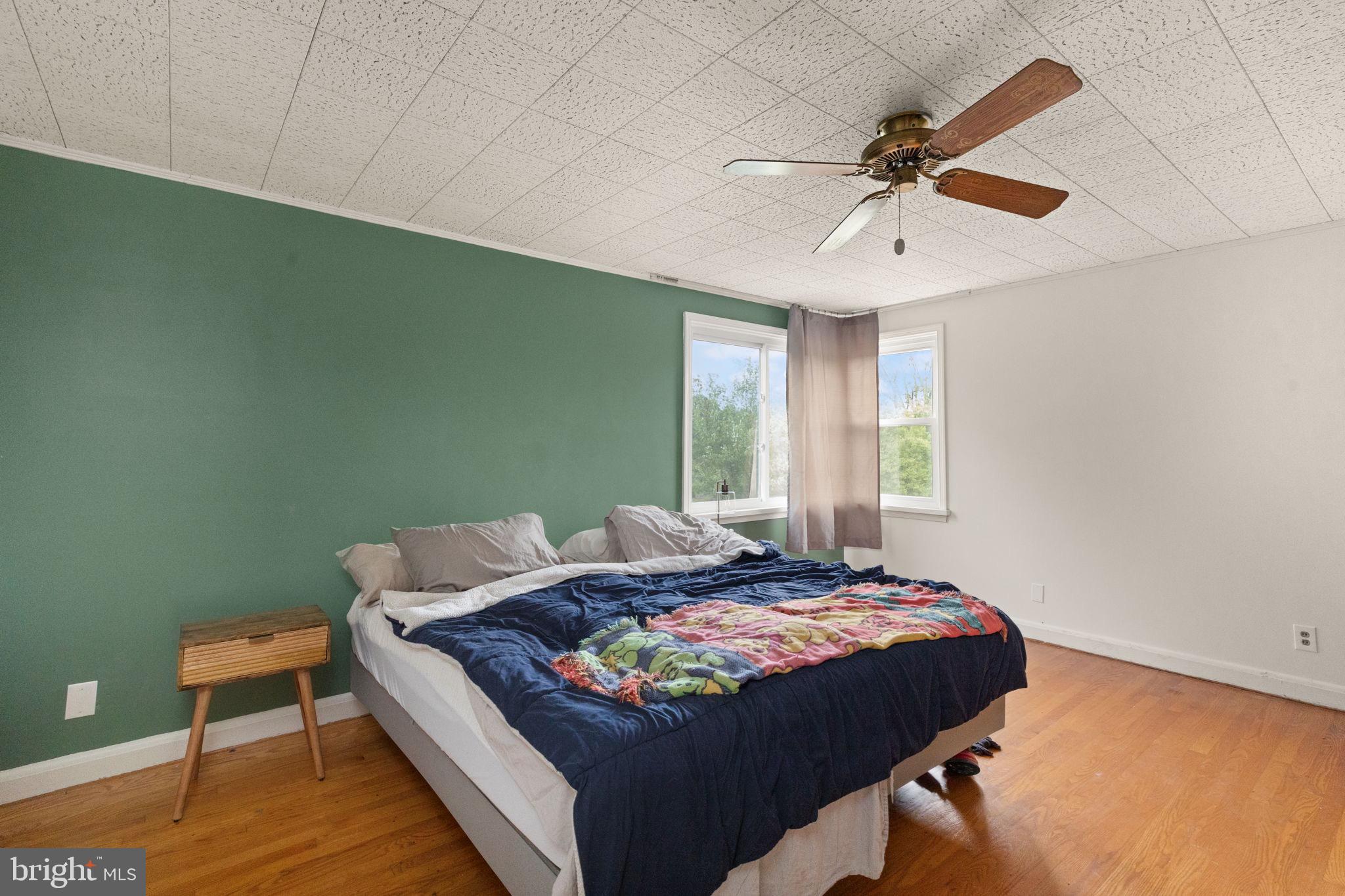 6607 Mt Vista Road Kingsville, MD 21087 - Photo 18 of 26 a bedroom with a bed and a window