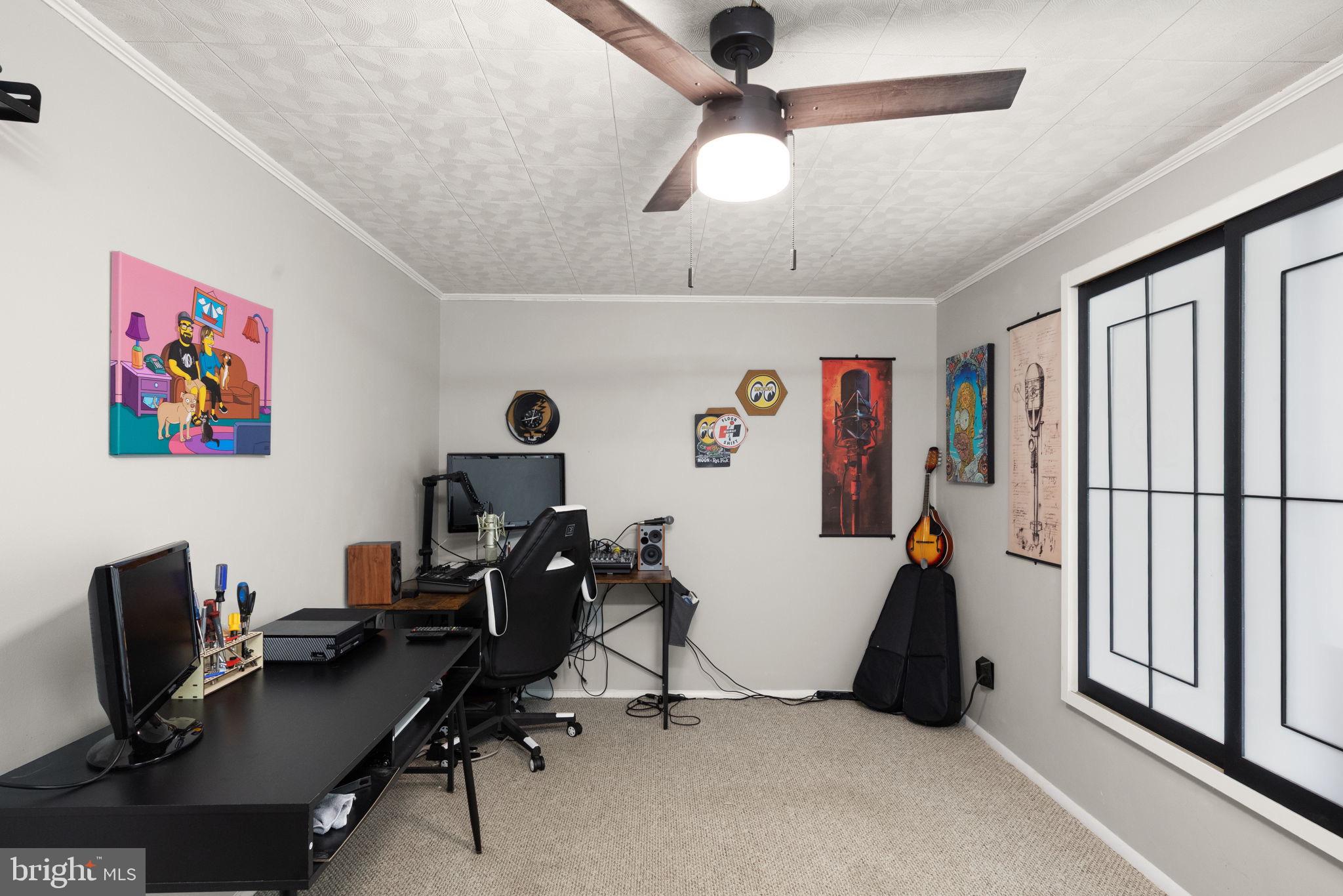 6607 Mt Vista Road Kingsville, MD 21087 - Photo 20 of 26 a view of a workspace with furniture and a window