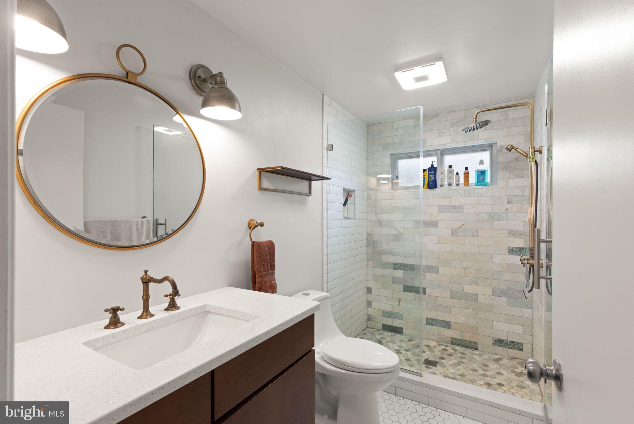 6607 Mt Vista Road Kingsville, MD 21087 - Photo 4 of 26 a bathroom with a sink toilet and shower