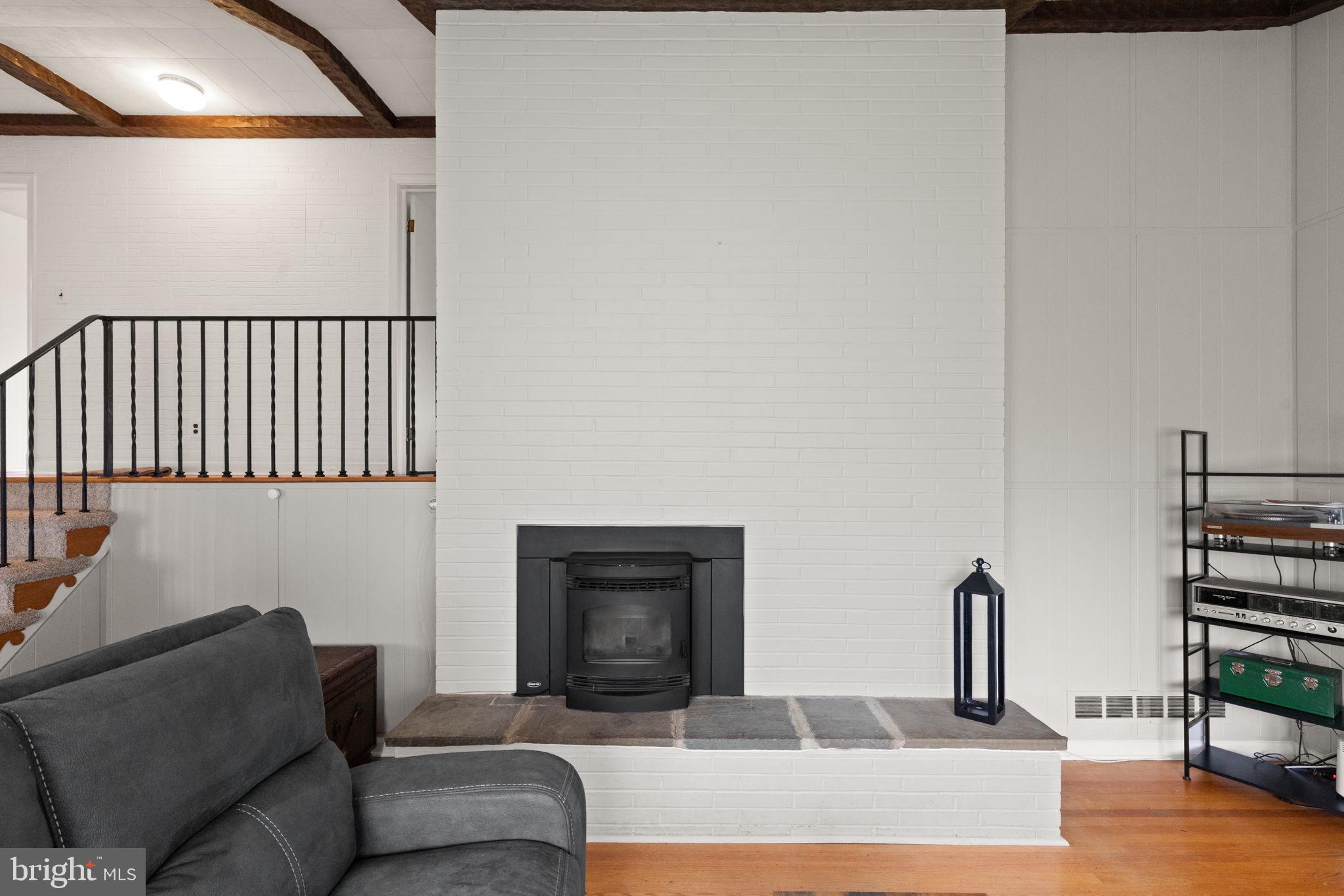 6607 Mt Vista Road Kingsville, MD 21087 - Photo 10 of 26 a living room with furniture and a fireplace