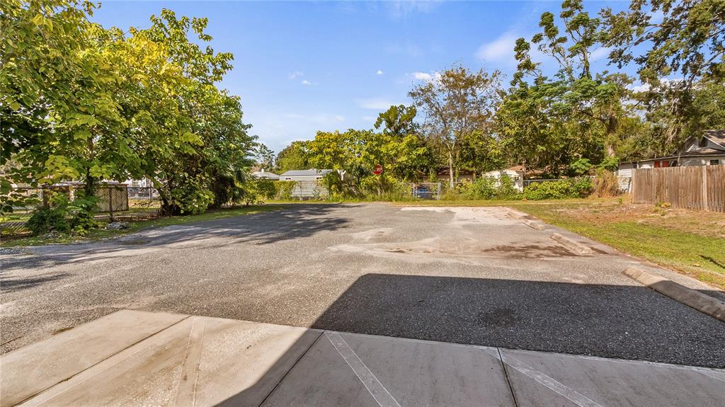 1704 West Main Street Leesburg, FL 34748 - Photo 35 of 37 a view of a yard with plants and trees