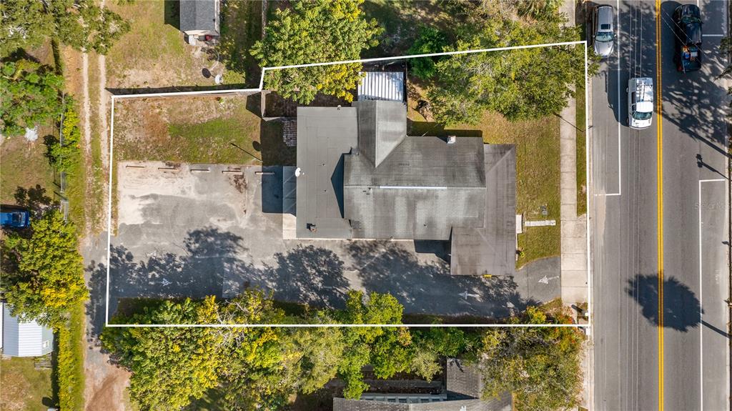 1704 West Main Street Leesburg, FL 34748 - Photo 4 of 37 a view of a garden