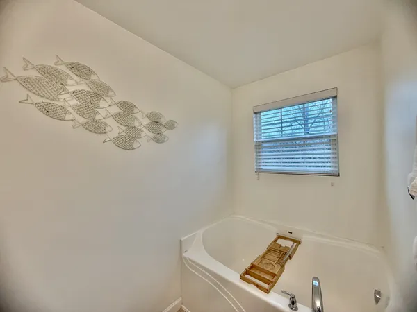 a view of a bathtub in a room
