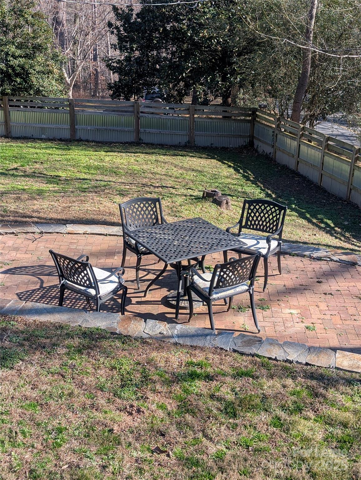 243 Woodland Road Tryon, NC 28782 - Photo 15 of 15 a view of a swimming pool with chair and table