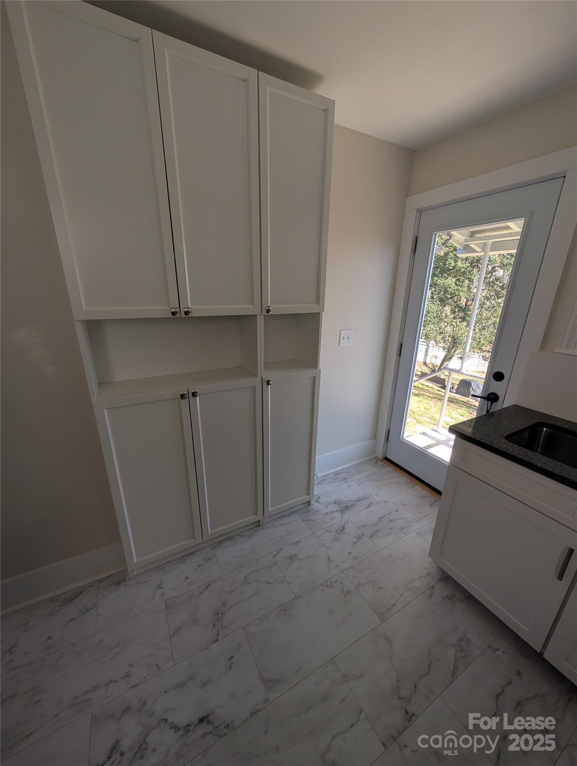 243 Woodland Road Tryon, NC 28782 - Photo 5 of 15 a view of an empty room with a window