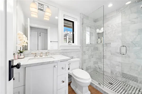 a view of a patio with a table and chairs