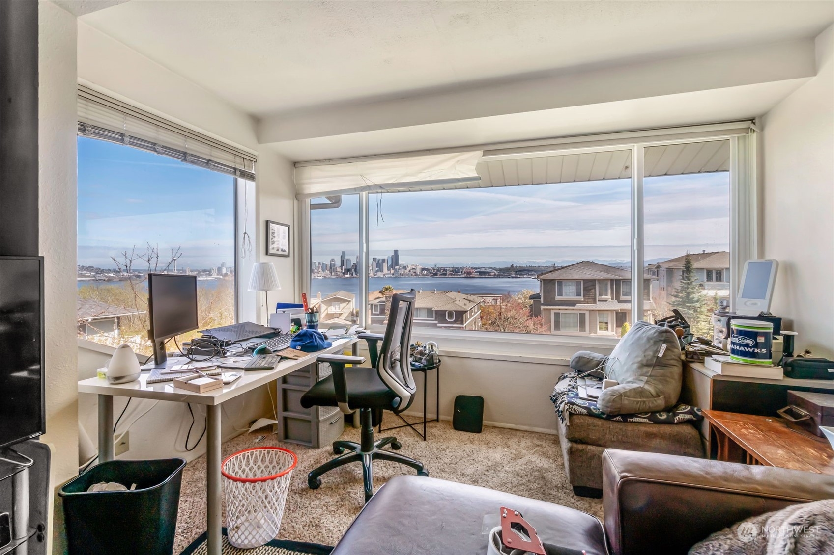 1330 California Avenue Southwest Seattle, WA 98116 - Photo 14 of 24 a work room with furniture and a large window