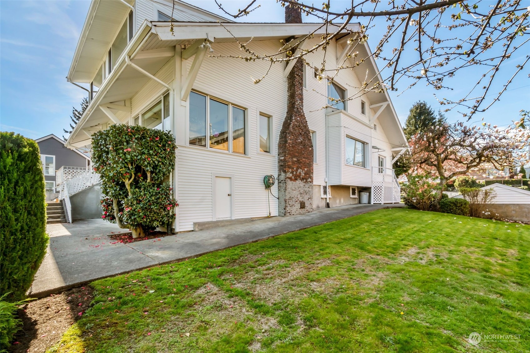 1330 California Avenue Southwest Seattle, WA 98116 - Photo 16 of 24 front view of a house with a yard