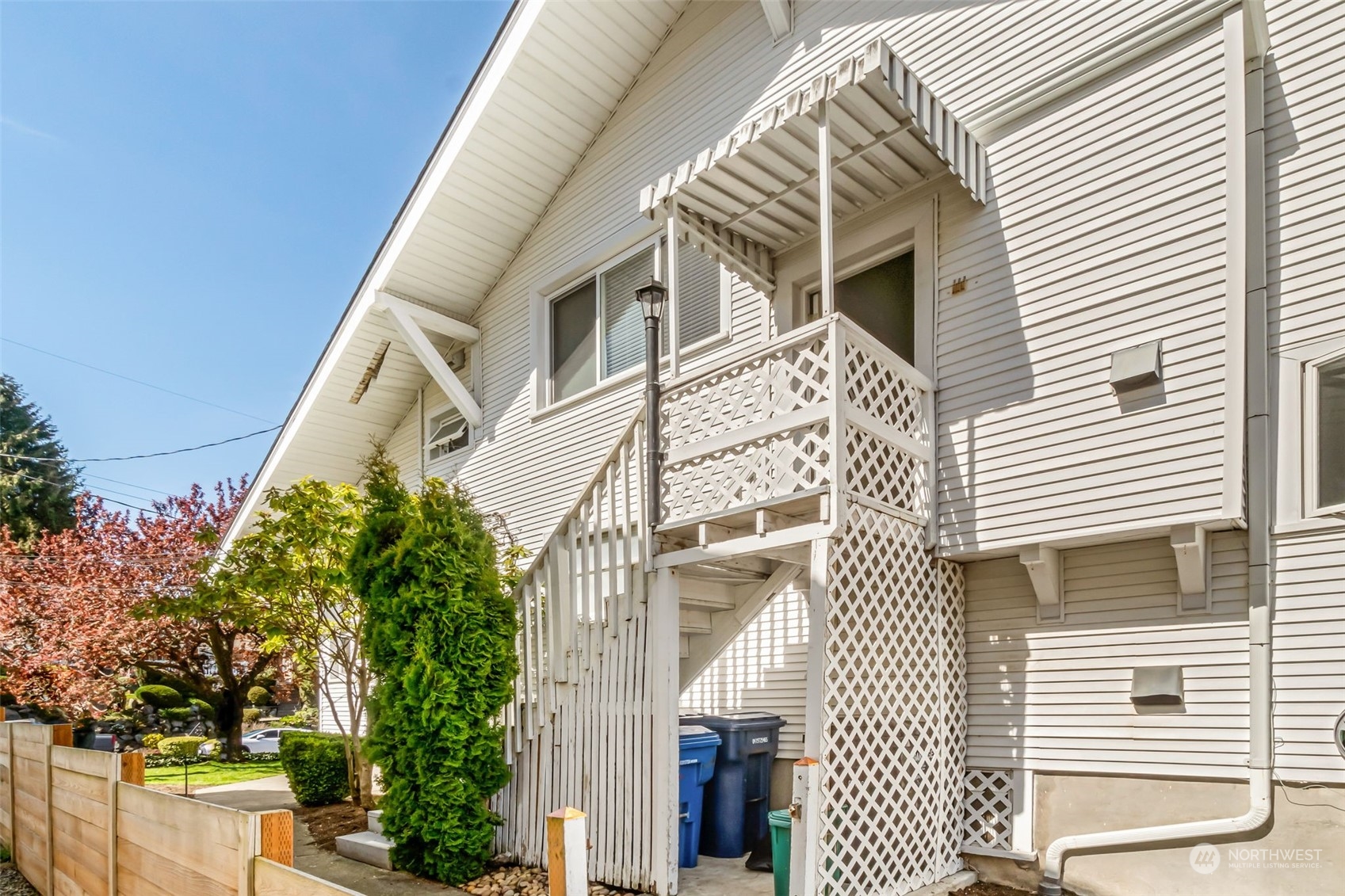 1330 California Avenue Southwest Seattle, WA 98116 - Photo 18 of 24 a view of a house with a white door