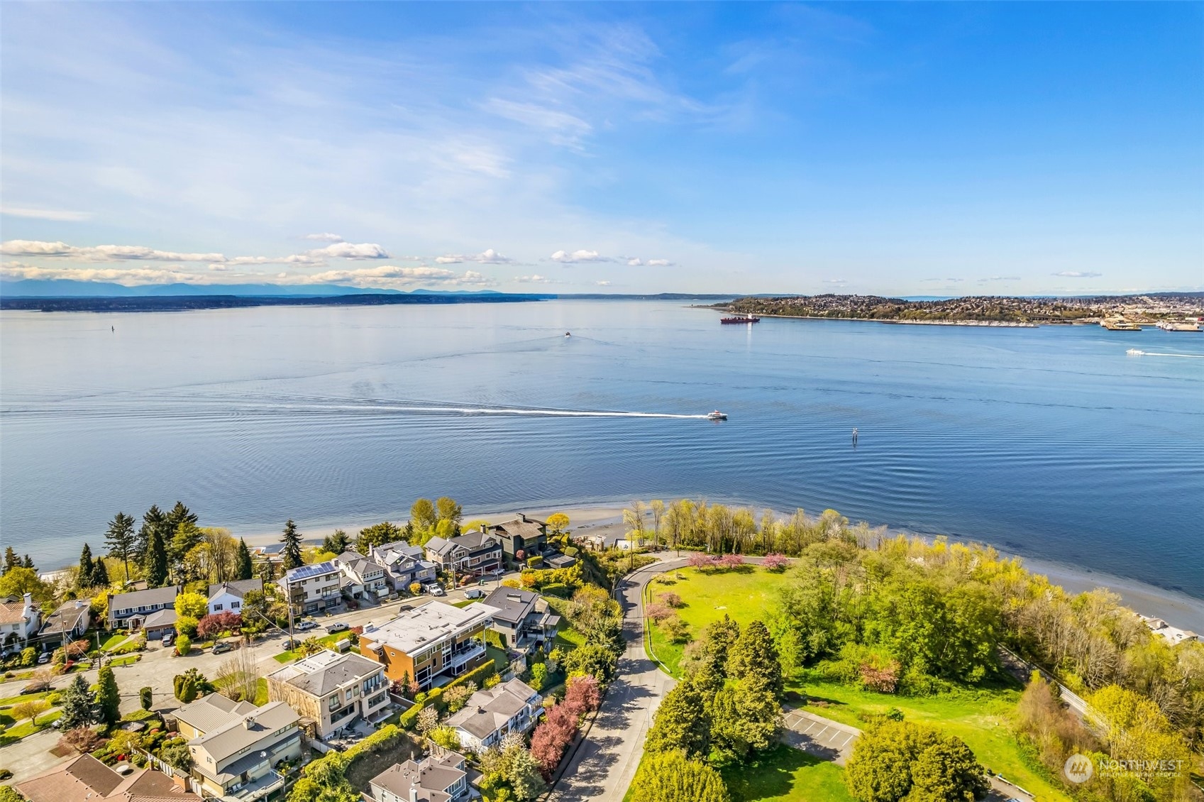 1330 California Avenue Southwest Seattle, WA 98116 - Photo 21 of 24 a view of a lake and mountain in the back