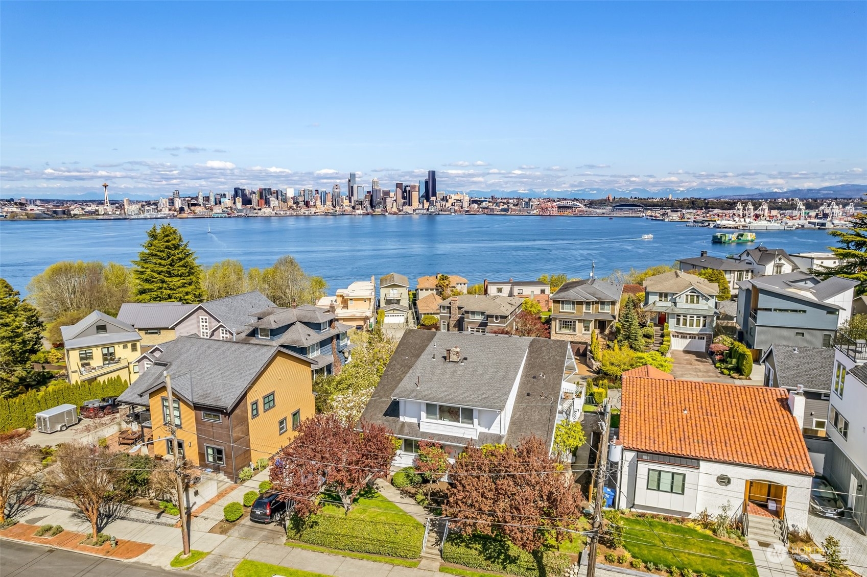 1330 California Avenue Southwest Seattle, WA 98116 - Photo 3 of 24 an aerial view of a residential building and lake view