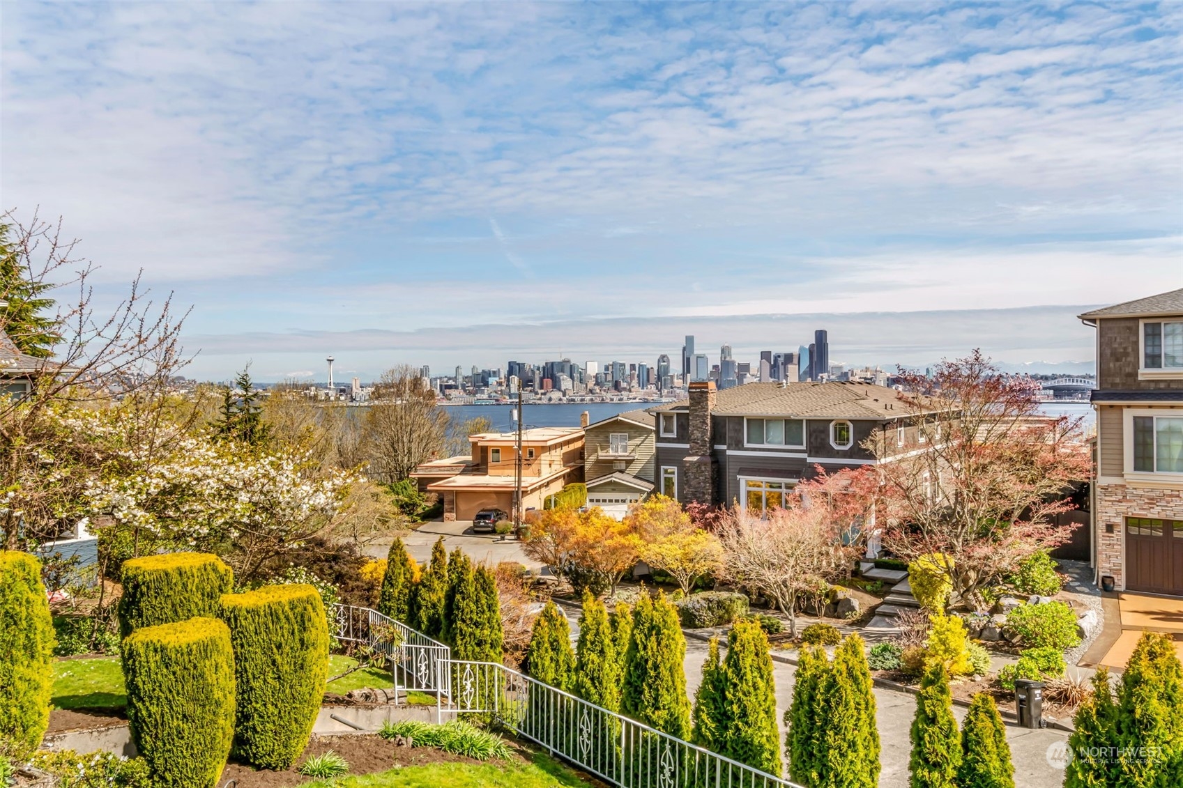 1330 California Avenue Southwest Seattle, WA 98116 - Photo 5 of 24 a view of a lake with building in front of it