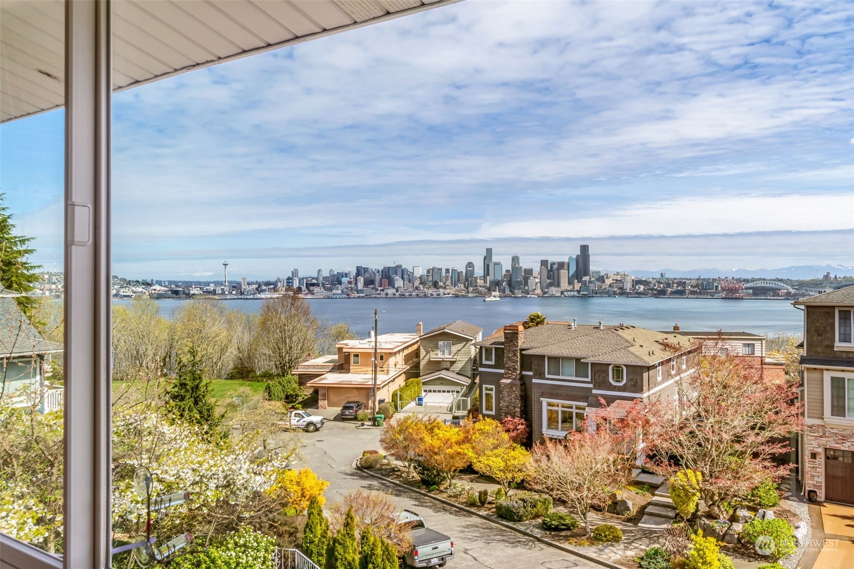 1330 California Avenue Southwest Seattle, WA 98116 - Photo 8 of 24 a view of a lake with lawn chairs
