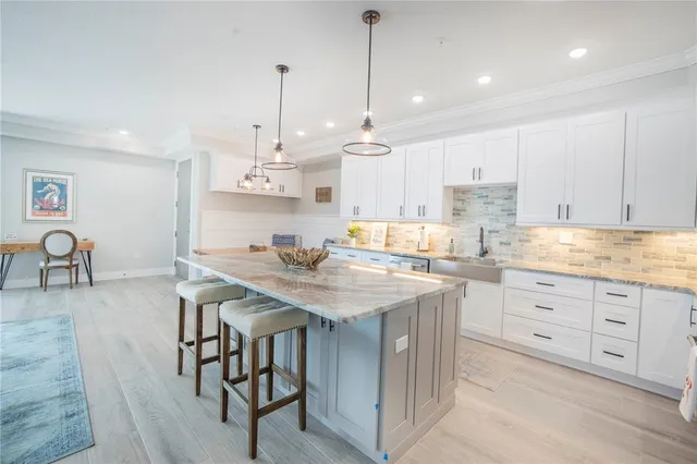 a spacious bathroom with a double vanity sink mirror double and shower