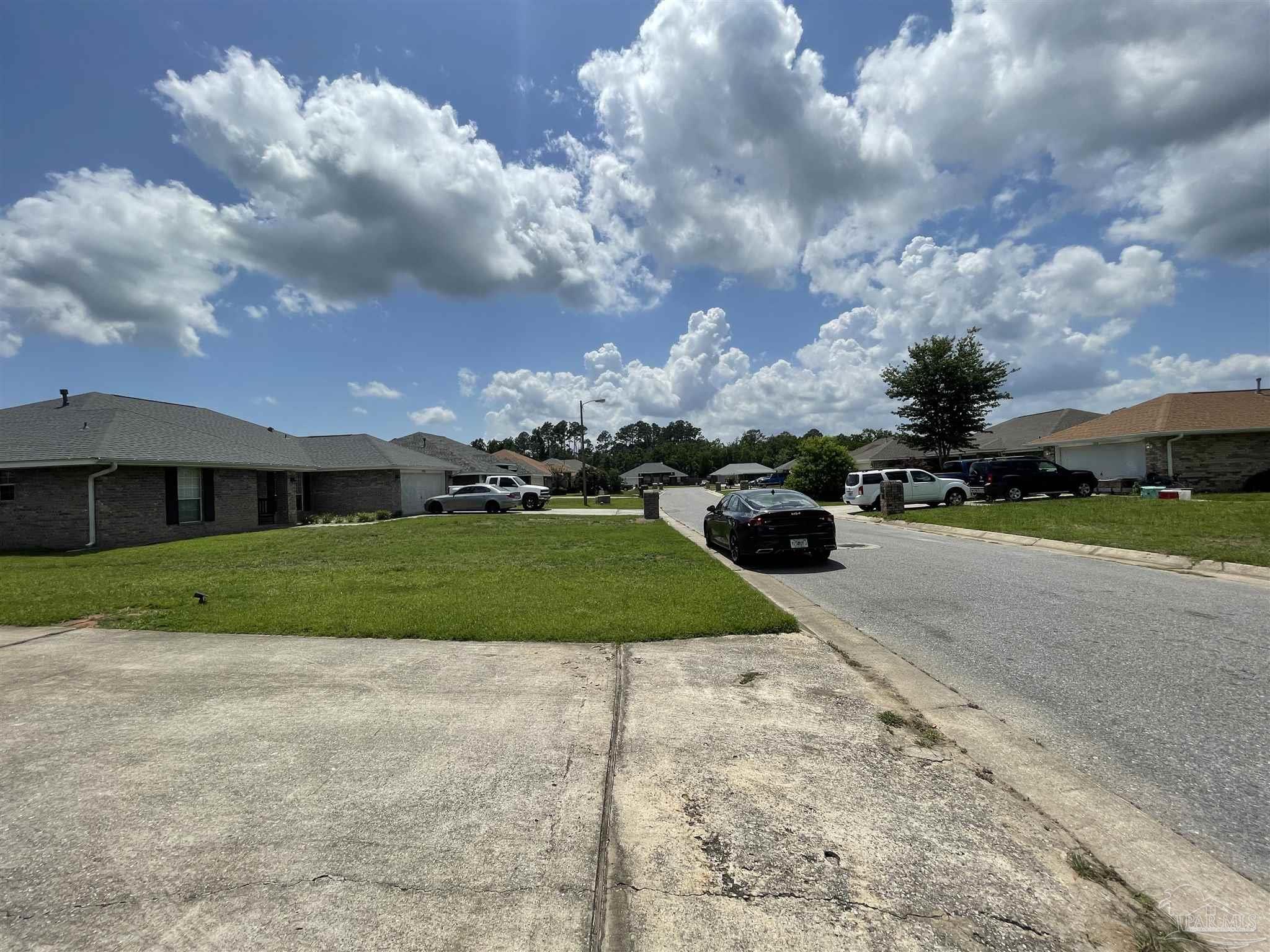 7025 Boo Lane Pensacola, FL 32526 - Photo 2 of 35 a view of green field