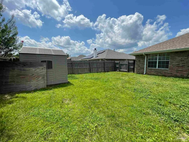 a front view of a house having yard