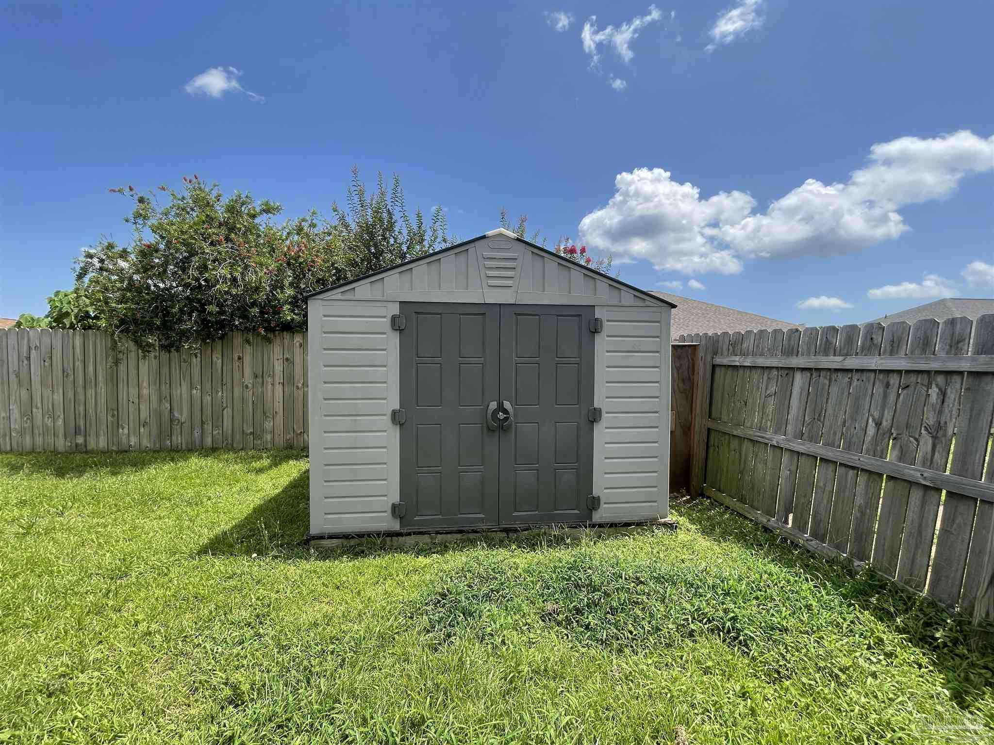 7025 Boo Lane Pensacola, FL 32526 - Photo 35 of 35 a front view of a house having yard