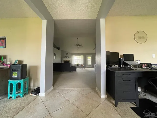 a view of kitchen and windows