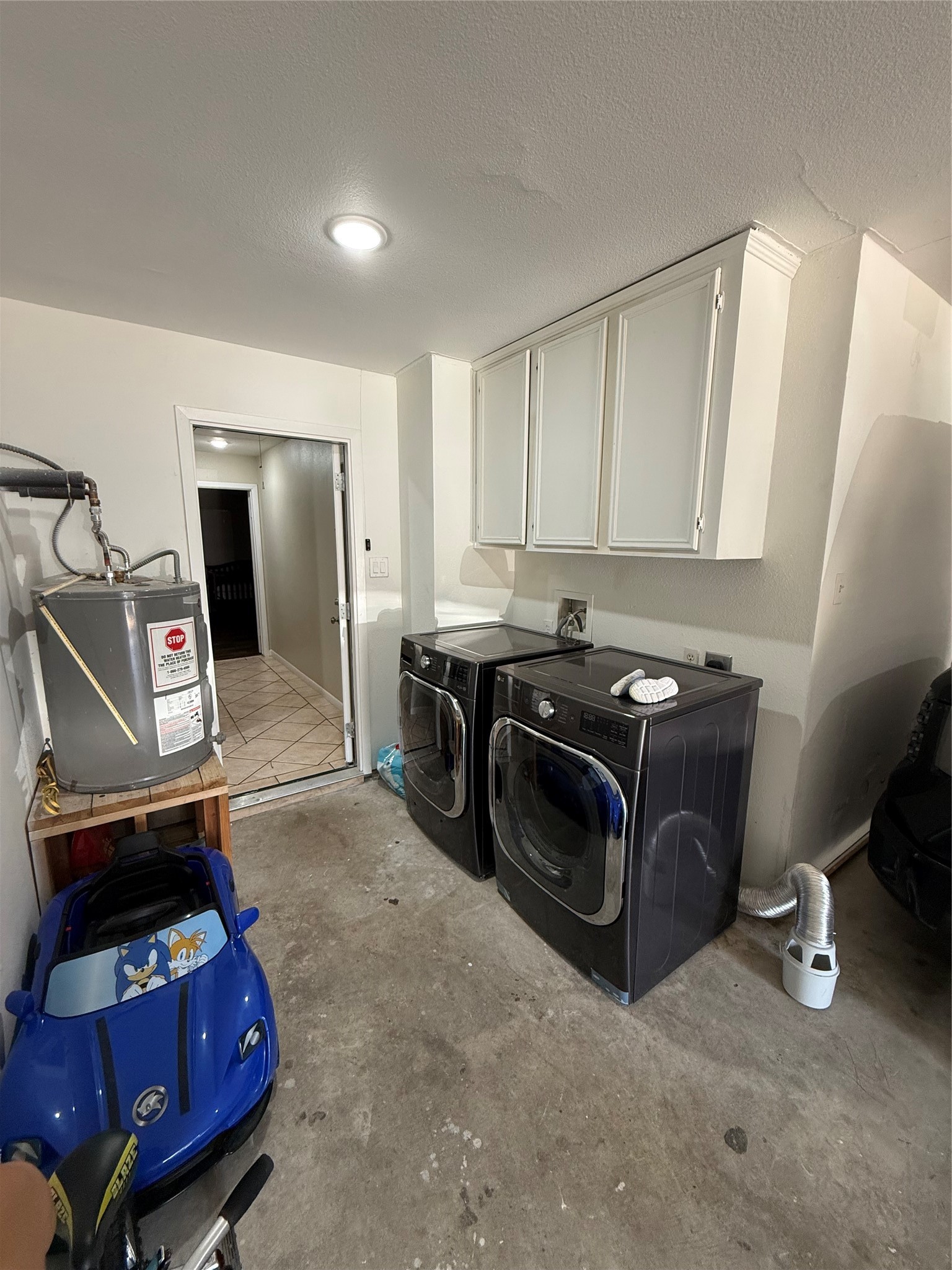 3103 Pine Dust Lane Spring, TX 77373 - Photo 24 of 29 a room with furniture and a flat screen tv