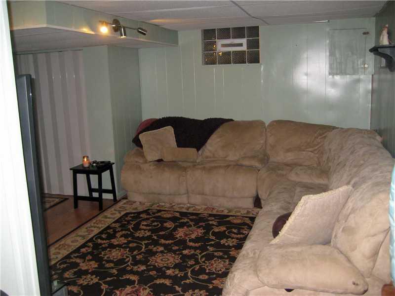 3203 McRoberts Road Castle Shannon, PA 15234 - Photo 13 of 25 Basement/Game Room. this gameroom is nicely finished w newer flooring and fresh paint,currently used for family space and workout space, could be an office, extra bedroom possibilities or home theatre..