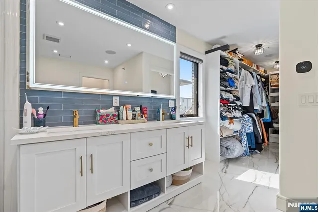 a bathroom with a toilet and a sink