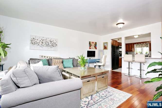 290 Hamilton Place, Unit 4 Hackensack, NJ 07601 - Photo 7 of 50 a living room with furniture and wooden floor