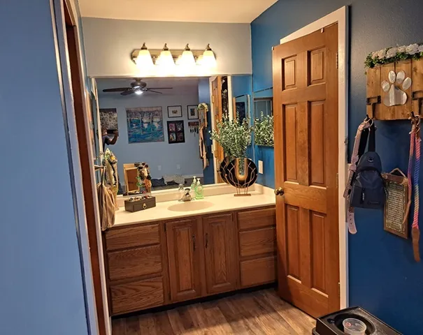 a bathroom with a sink and a mirror