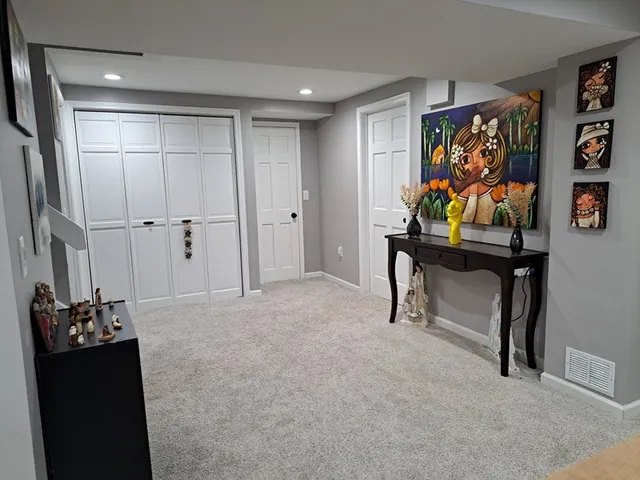 a view of a workspace with furniture