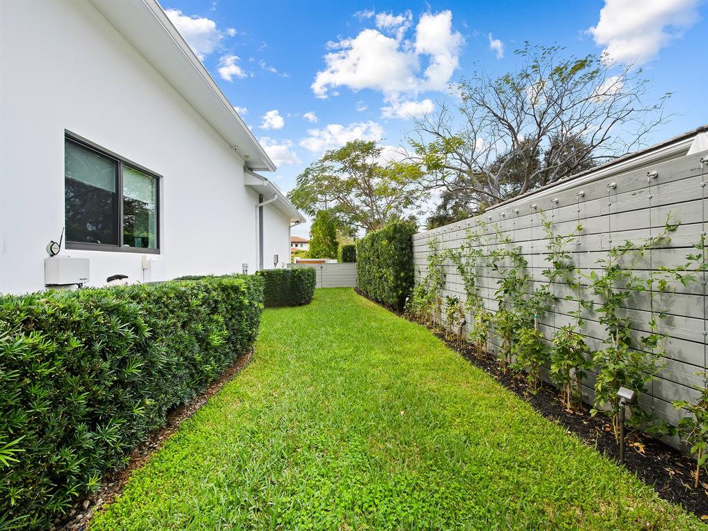 1710 Middle River Drive Fort Lauderdale, FL 33305 - Photo 11 of 47 a front view of a house with a yard