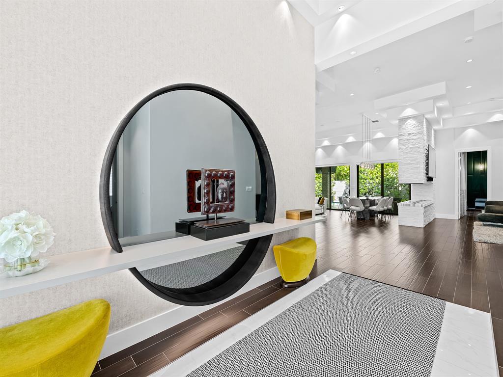 1710 Middle River Drive Fort Lauderdale, FL 33305 - Photo 16 of 47 a swimming pool with dining table and chairs