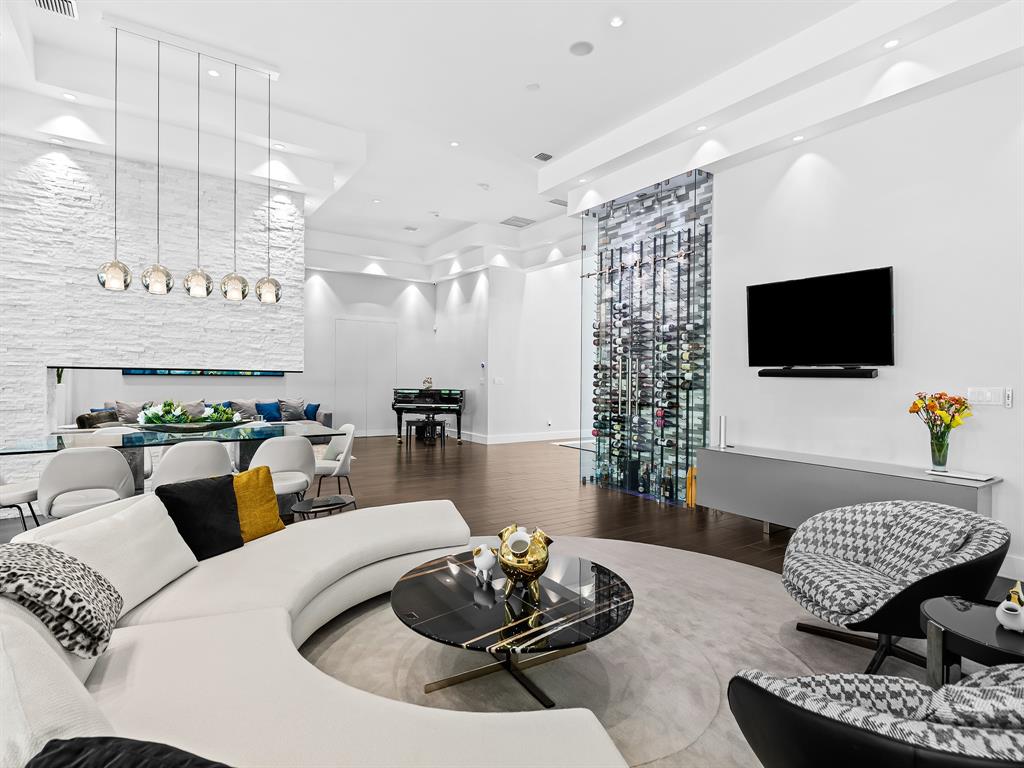 1710 Middle River Drive Fort Lauderdale, FL 33305 - Photo 20 of 47 a living room with furniture and a flat screen tv