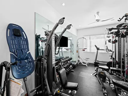 a view of a room with gym equipment