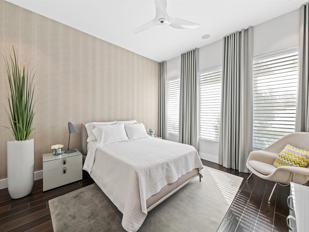 1710 Middle River Drive Fort Lauderdale, FL 33305 - Photo 32 of 47 a bedroom with a bed and a potted plant