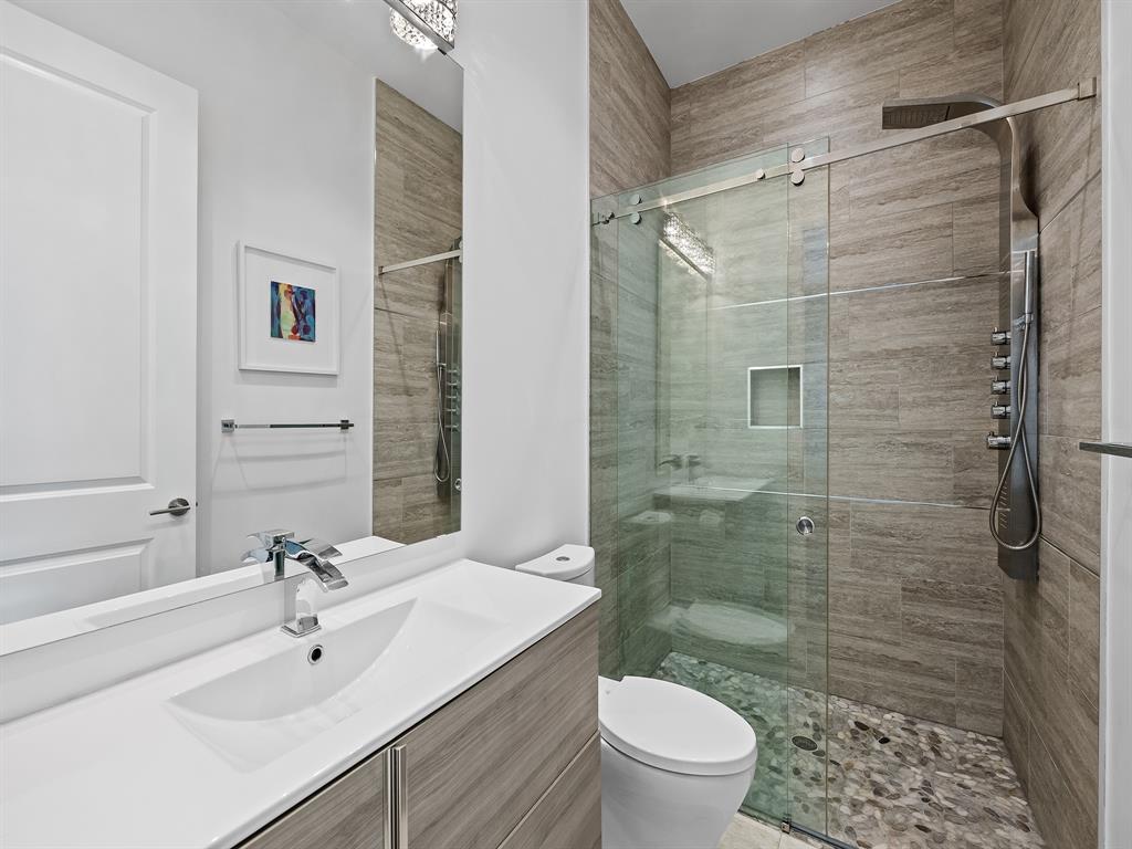 1710 Middle River Drive Fort Lauderdale, FL 33305 - Photo 34 of 47 a bathroom with a sink toilet and shower