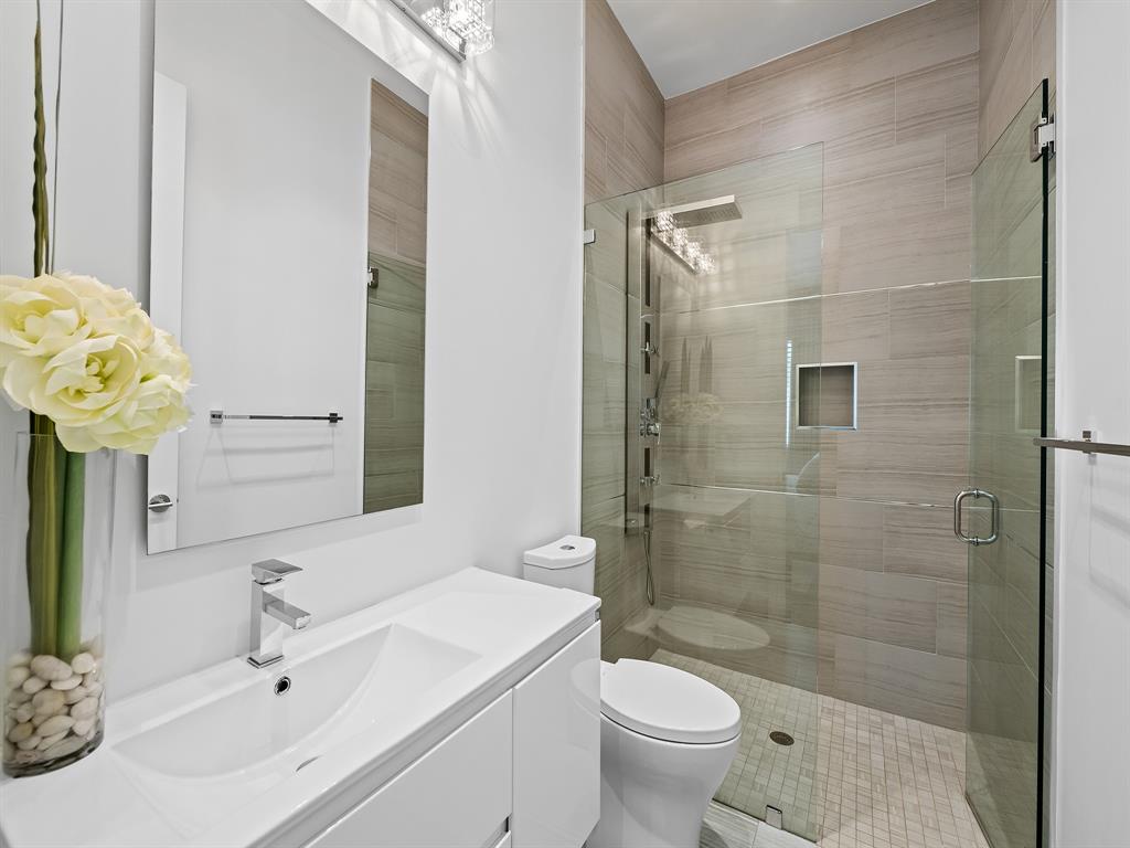 1710 Middle River Drive Fort Lauderdale, FL 33305 - Photo 37 of 47 a bathroom with a sink toilet and shower