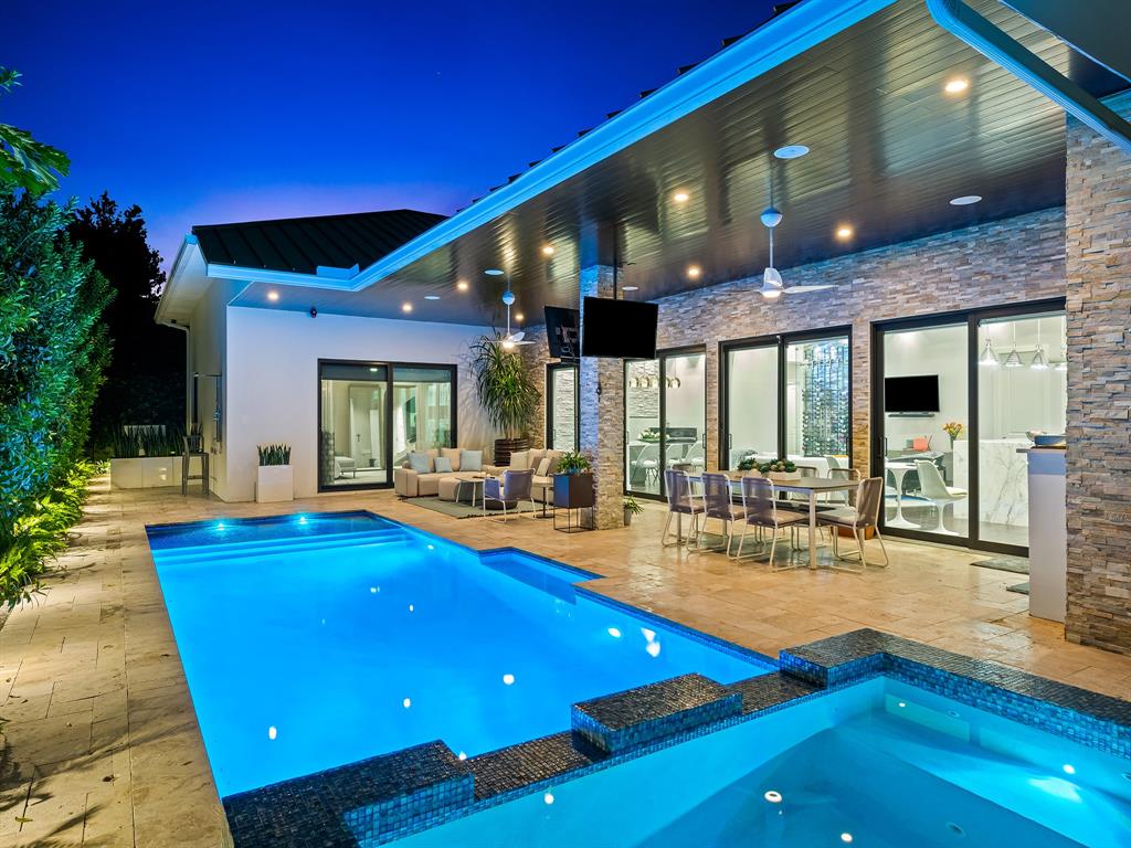 1710 Middle River Drive Fort Lauderdale, FL 33305 - Photo 46 of 47 a view of swimming pool with outdoor seating